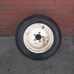 Gebruikte velg compleet met band 23x10.50-12 Kubota