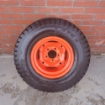 Gebruikt velg met band  compleet Kubota 26x12,00-12 NHS OTR grass master