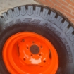 Gebruikt velg met band  compleet Kubota 26x12,00-12 NHS OTR grass master