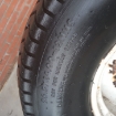 Gebruikte velg met band 26.5x14.00-12NHS Carlisle Ultra trac